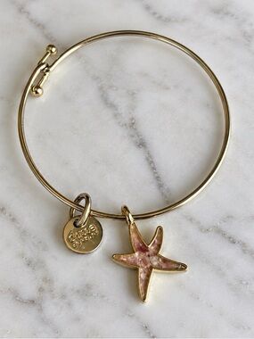 Dune Silvertone Starfish bangle with charm that says handmade in USA